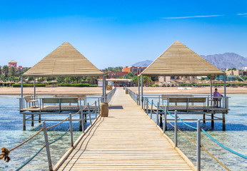 Pier on the beach background