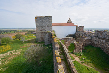 Fototapeta na wymiar Mourao castle towers and wall historic building with interior garden in Alentejo, Portugal