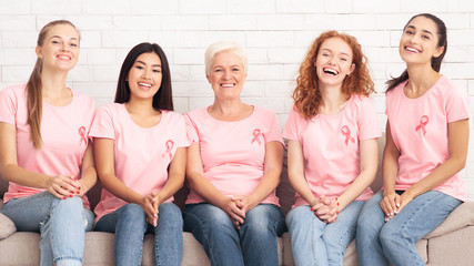 Ladies In Cancer T-Shirts Sitting During Support Group Meeting Indoor