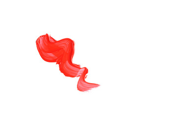 A wavy smear of coral paint is insulated on a white background.