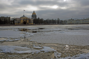 View of Saint Isaac's Cathedral and Neva river with moving ice in Saint Petersburg, Russia