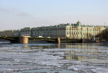 View of Winter Palace and Neva river with moving ice in Saint Petersburg, Russia