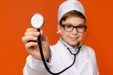 Little friendly doctor ready to examine you