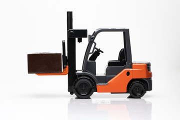 A forklift truck, detail view, forklift in white background
