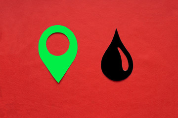 The geolocation sign is green, with a drop of oil on a red background. Oil and petroleum products...