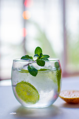 Close up of a refreshing and delicious mojito on a table