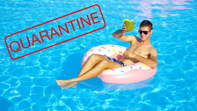 CLOSE UP: Man On Cool Spring Break Enjoys His Pineapple Drink While In A Pool