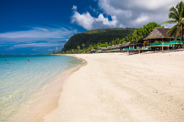 Lalomanu beach with open huts called fales, south side of Upolu Island, Samoa