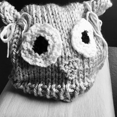 black and white hand made tea cosy on teapot 