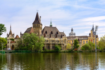 Fototapeta na wymiar Vajdahunyad Castle in Budapest. The castle is a decoration of Varoshliget park. Vaidahunyad Castle houses the Agricultural Museum.