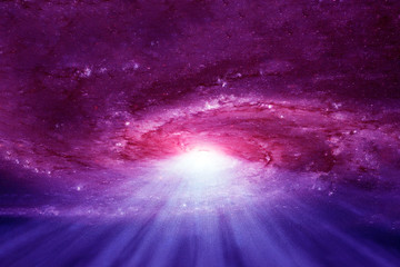 Naklejka na ściany i meble Purple galaxy in deep space. Elements of this image were furnished by NASA.