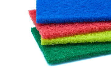 fiber scraper red blue green yellow close up isolated on white background