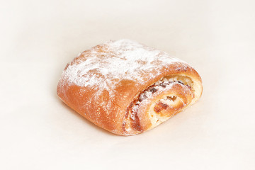 Strudel, Fresh baked goods. Closeup on a light background