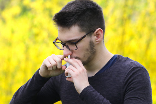  Pollen Allergy,  Teenager Boy Using Nose Inhaler In Park