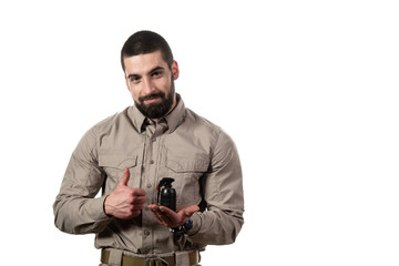 Fototapeta na wymiar Man Showing Thumbs Up and Holding a Bomb