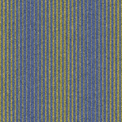 Jeans background with vertical gold stripes ornament. Denim seamless pattern. Blue patterned fabric.