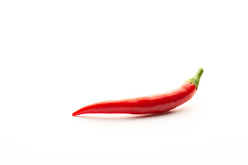 Red chili peppers on a white background. Isolate. Hot peppers. Fresh pod of red pepper.