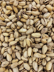 lots of pistachio nuts to eat like a background