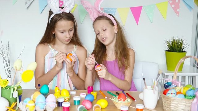 Happy easter. Beautiful little kids wearing bunny ears on Easter day.