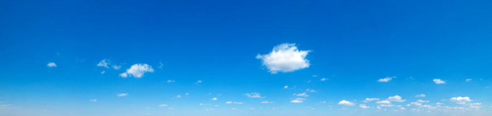 Blue Sky background with tiny Clouds. Panorama background