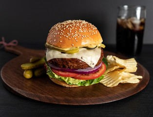 Homemade burger on a dark background