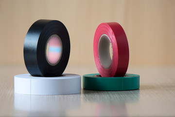 Four colorful insulating tapes to insulate the twist of electrical wires.