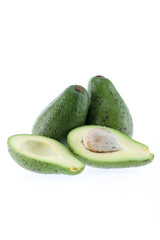 Avocado half cut isolated on white Clipping Path. Professional food photography