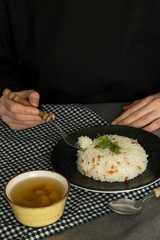 the rice food service in the plate at the restaurant.