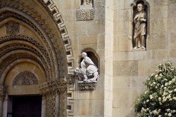Yak Chapel in Budapest. In the facade of the church are carved statues of Jesus Christ and 12...