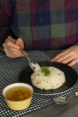 the rice food service in the plate at the restaurant.