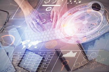 Double exposure of man's hands typing over computer keyboard and data theme hologram drawing. Top view. Technology concept.