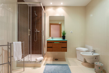 Modern shower room with a booth. European hotel design.