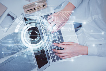 Double exposure of woman hands working on computer and data theme hologram drawing. Top View. Technology concept.