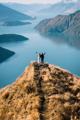 A newly wed posing at Roy's Peak, Wanaka