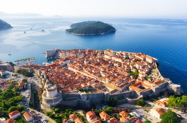Dudrovnik, Croatia. Aerial view on the old town. Vacation and adventure. Town and sea. Top view from drone at on the old castle and azure sea. Travel - image - obrazy, fototapety, plakaty