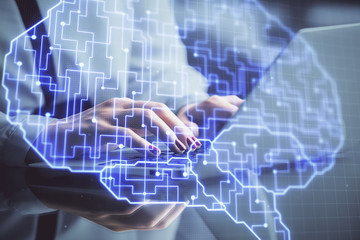 Multi exposure of woman hands working on computer and human brain hologram drawing. Ai tech concept.