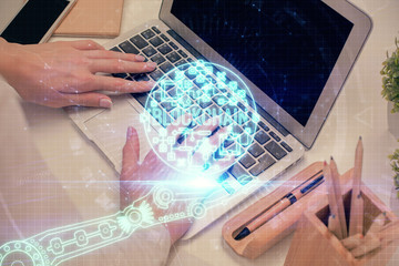 Double exposure of woman hands typing on computer and crypto market theme hologram drawing. Blockchain concept.