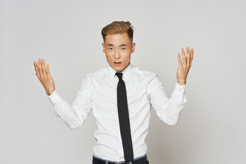 young businessman showing stop sign