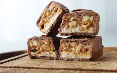 chocolate candy bar with peanuts and nougat