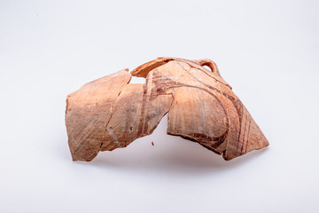 Archaeological excavations. The remains of ancient ancient clay jugs. Tripolie.