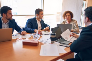 Obraz premium Business lawyers workers meeting at law firm office. Professional executive partners working on finance strategry at the workplace