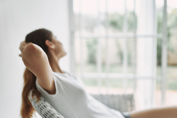 young woman sitting on the floor