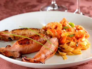 Squid stuffed with fresh campignon and fettuccini with shrimp sauce