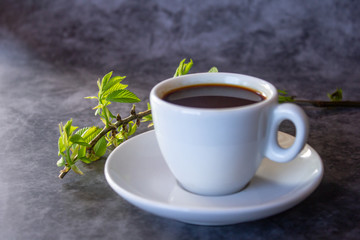 cup of aromatic hot coffee on a dark background flat lay