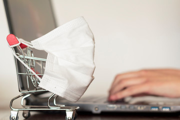 Woman hands using computer for online shopping concept.