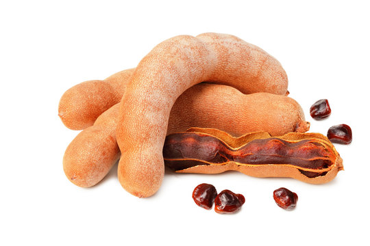 fresh tamarind fruits isolated on white background