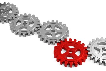 Row of metal cogwheel gears with a central red wheel over white background, teamwork, connection or communiaction abstract concept