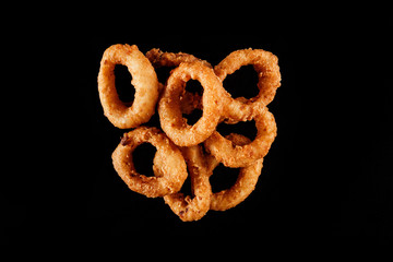 A delicious crunchy home made onion rings perfect for home delivery and recommended for food menu content.