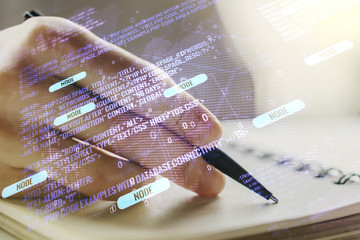 Double exposure of abstract creative programming illustration with world map and man hand writing in notepad on background, big data and blockchain concept