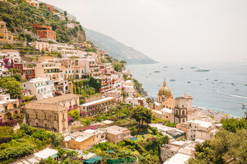 View of the town of Positano with flowers - obrazy, fototapety, plakaty
